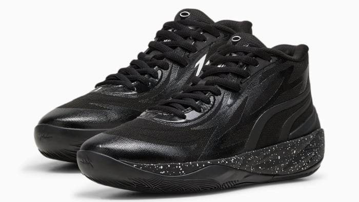 Side view of LaMelo Ball's black PUMA shoes.